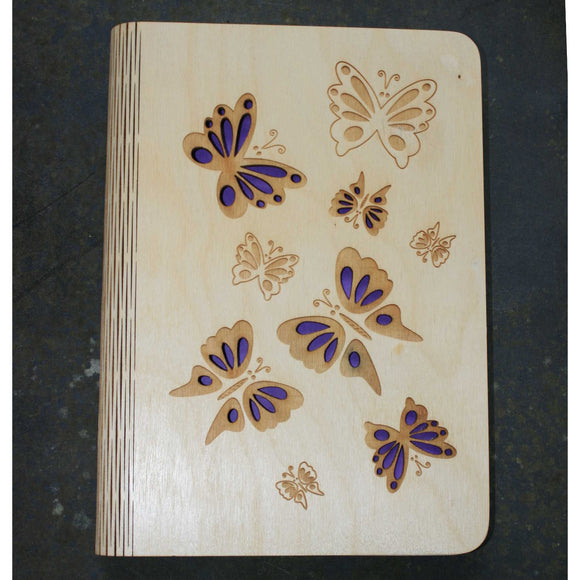 wooden note book cover with a butterflies design