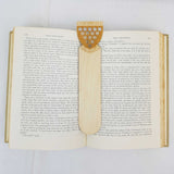 Cornwall shield bookmark shown being used in a book