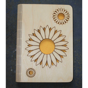 wooden note book cover with a sunflower design