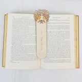 Celtic tree of life bookmark shown being used in a book