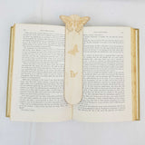 butterfly bookmark shown being used in a book