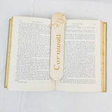 Cornwall map bookmark shown being used in a book