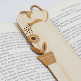 close up of gardening details - the watering can and the sunflower
