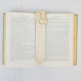 hippo bookmark shown being used in a book