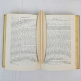 stripe surfboard bookmark shown being used in a book