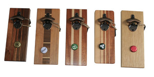 Image of 5 wooden bottle openers of different types of hardwood with magnetic bottle top catches.