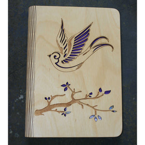 wooden writting notebook cover with a bird and branch design