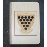 wooden note book cover with a Cornwall shield design