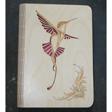 wooden note book cover with a hummingbird design