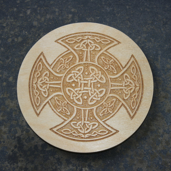Wooden coaster with a Celtic cross design