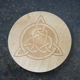 Wooden coaster with a Celtic tri-knot design