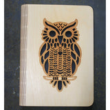 wooden note book cover with an owl design