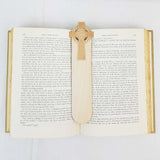 Celtic cross bookmark shown being used in a book