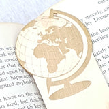 Close up of the detail of the world globe on the global explorer wooden bookmark