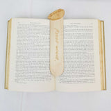 Cornish pasty bookmark shown being used in a book